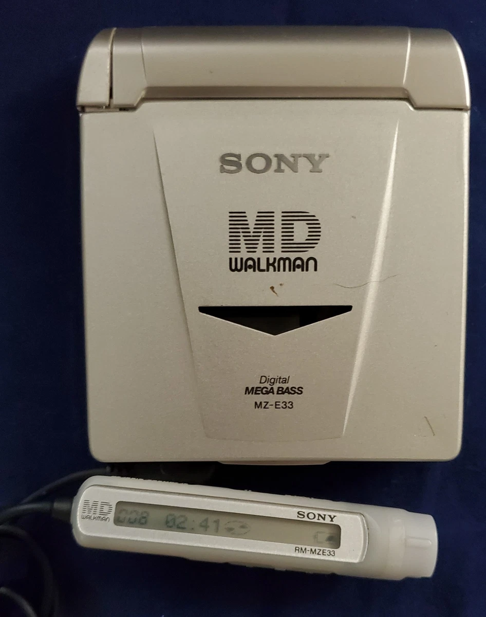 Silver Sony MiniDisc Player (Walkman) Personal MiniDisc Recorders