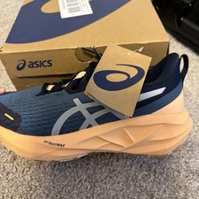 ASICS Womens NOVABLAST 5 LITE-SHOW 1012B910 4...