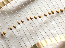 75pc .01uf 50v 10 AVX AXIAL BEAD CERAMIC CAPACITOR X7R