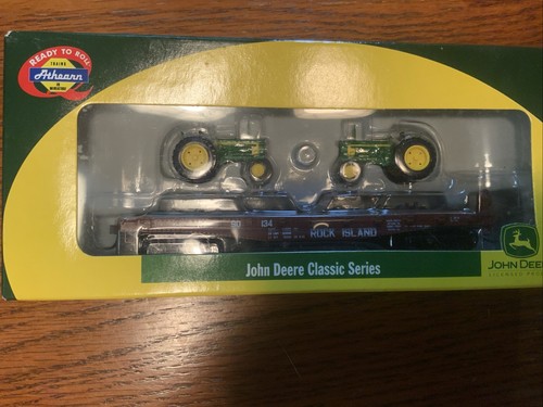 Coche plano Athearn HO Rock Island 40' con carga de tractor John Deere modelo B #8150 | Zustand: New