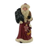Vintage Rustic Santa Claus with Toys Carrying a Tree.