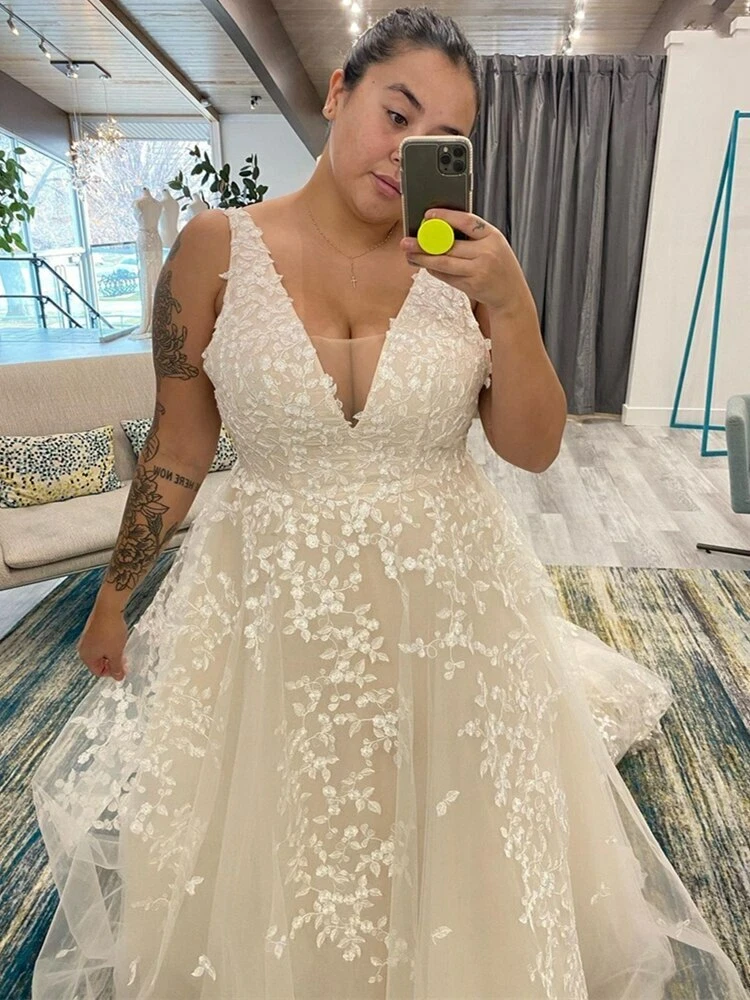 Low cut shop bridal gowns
