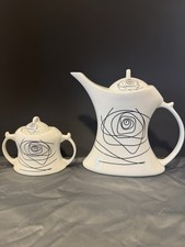 White Ceramic Tea Set with Teapot, Sugar Bowl, Lids, Abstract Black Swirl Design