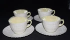 4 BELLEEK LIMPET CUPS & SAUCERS YELLOW INTERIOR GREEN MARK