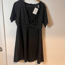 Black Bloom Chic scallop v neck detail. Size 14 mid length dress. New with tags!