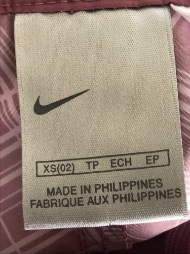 Pantalones Cortos para Caminar Nike Para Mujer Atléticos Informales Talla XS Púrpura Escotilla Cruzada Bolsillos con Cremallera - Imagen 8 de 8