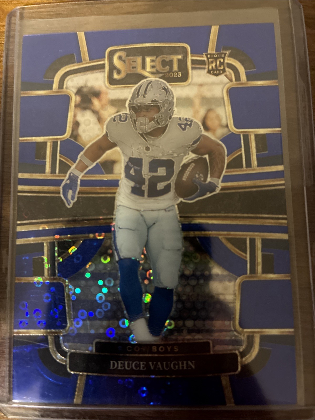 2023 Panini Select - Concourse Deuce Vaughn #28 Blue Disco Prizm /25 (RC)