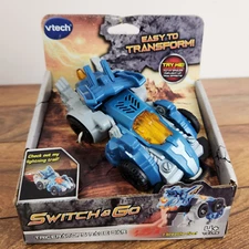 VTECH Switch & Go Triceratops Light up Race Car Transforming Toy New Great Gift