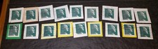 Lot of 18 23 cent canceled George Washington stamps adhered to paper