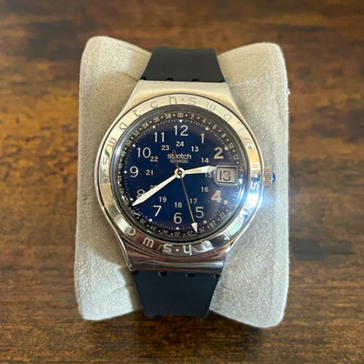 Swatch Irony Quartz Blue Dial Date 24-Hour Stainless Steel
