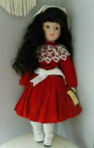 porcelain doll red velvet dress