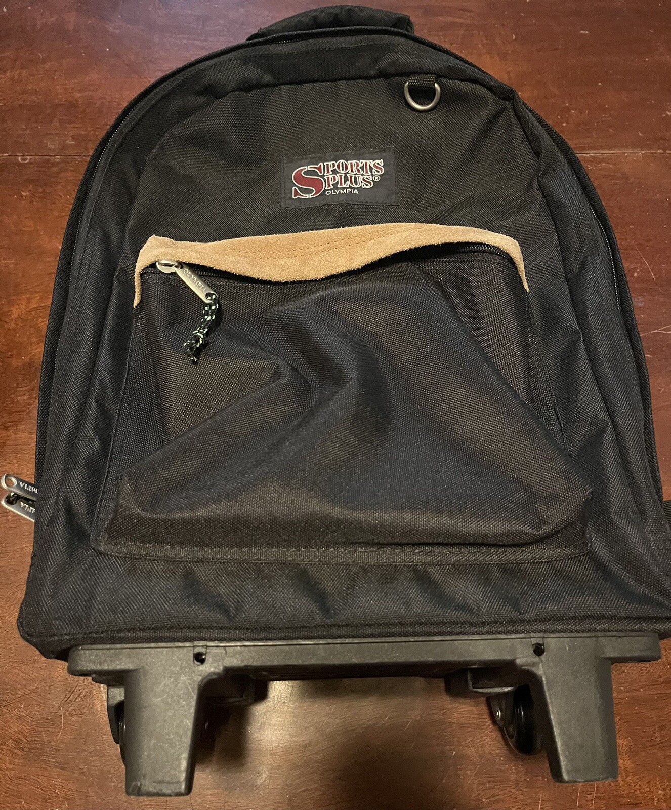 Vintage Sports Plus Olympia Rolling Backpack Carryon Bag