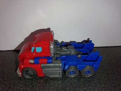 Transformers EarthSpark 1-Step Flip Changer Optimus Prime action figure