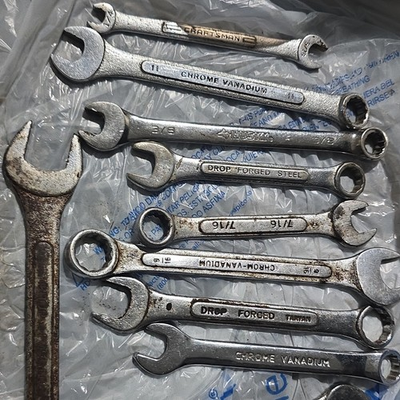 #ad 12 Combination Wrenches of various brands including a craftsman and a husky $8.00