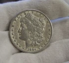 1884 O US Morgan Silver Dollar $1 VF/XF (Cleaned)
