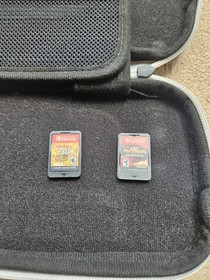 White Nintendo Switch OLED w/ Case & 2 Games (Zelda & Metroid)