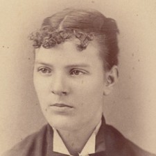 PORTRAIT OF WOMAN W/ UNUSUAL CURLY BANGS   RUFFLED BOW