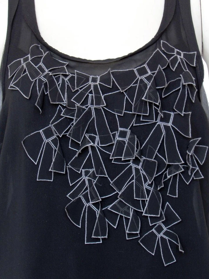 Blusa túnica sin mangas Ted Baker relajada negra con apliques de lazo talla 1 EE. UU. 4 S Foto 2 de 4