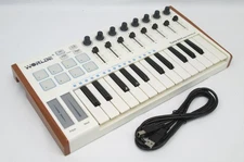 Worlde Tuna Mini MIDI Keyboard Controller 25-Key Portable 5-Volts 100mA + cable