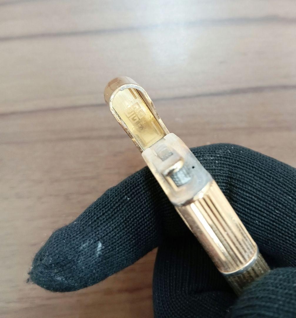 Givenchy gold lighter body used smoking accessories thumbnail 5