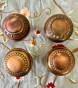 Two Sets of Antique Brass and Copper Beaded Pattern Door Knobs Architectural