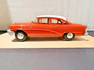 1955 Buick Roadmaster 1:25 scale model car. Red/white 4 door sedan dealer promo