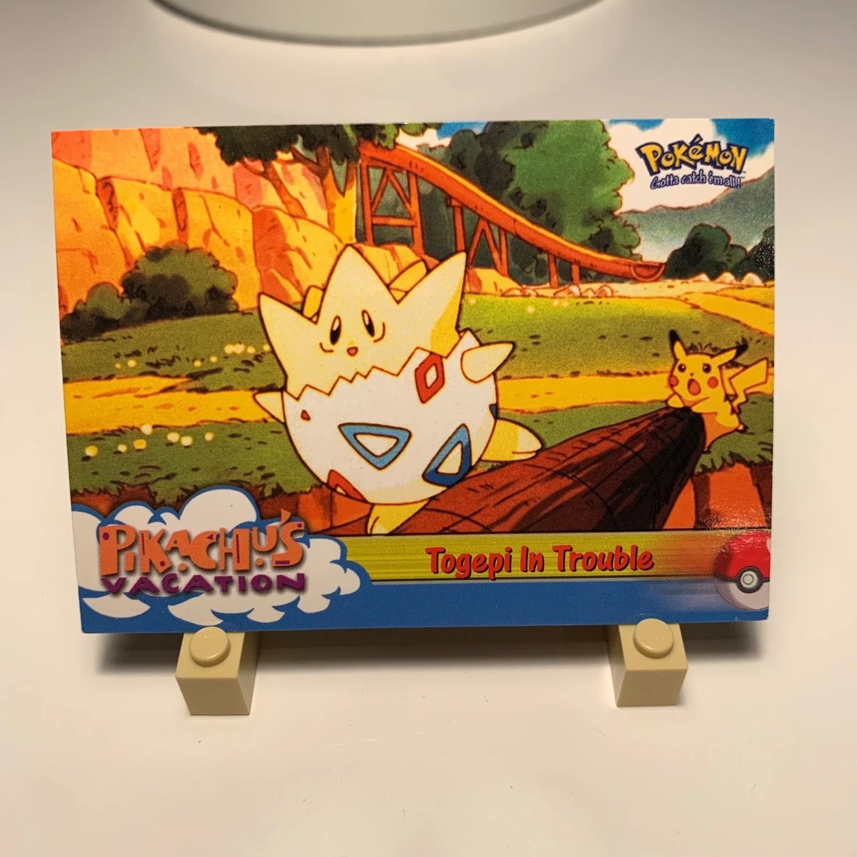 pokemon gold card price Pokémon Card First Movie #28 The Chase For Pikachu Blue Logo 1st Print –  AGS Collectibles main image 1