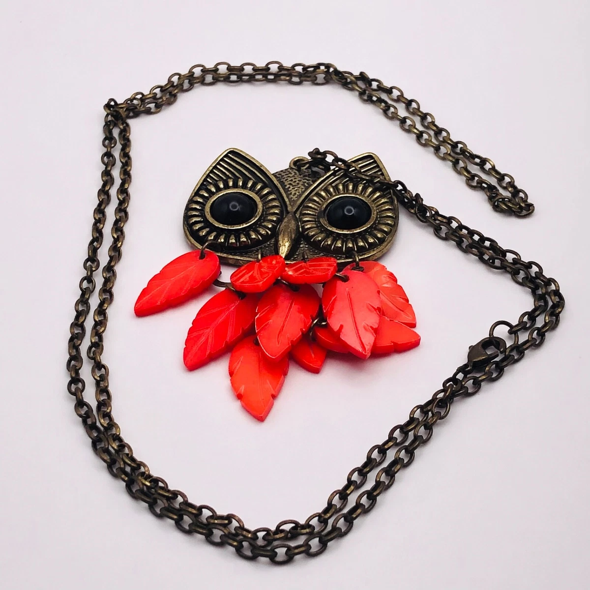 Red feather pendant deals