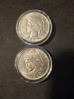 1x1922 1x1924 silver uncirculated peace dollars.90% silver.