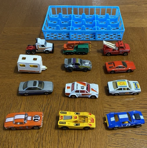 Lot of 12 Vintage Matchbox Cars & Trucks In Blue Plastic Car Holder