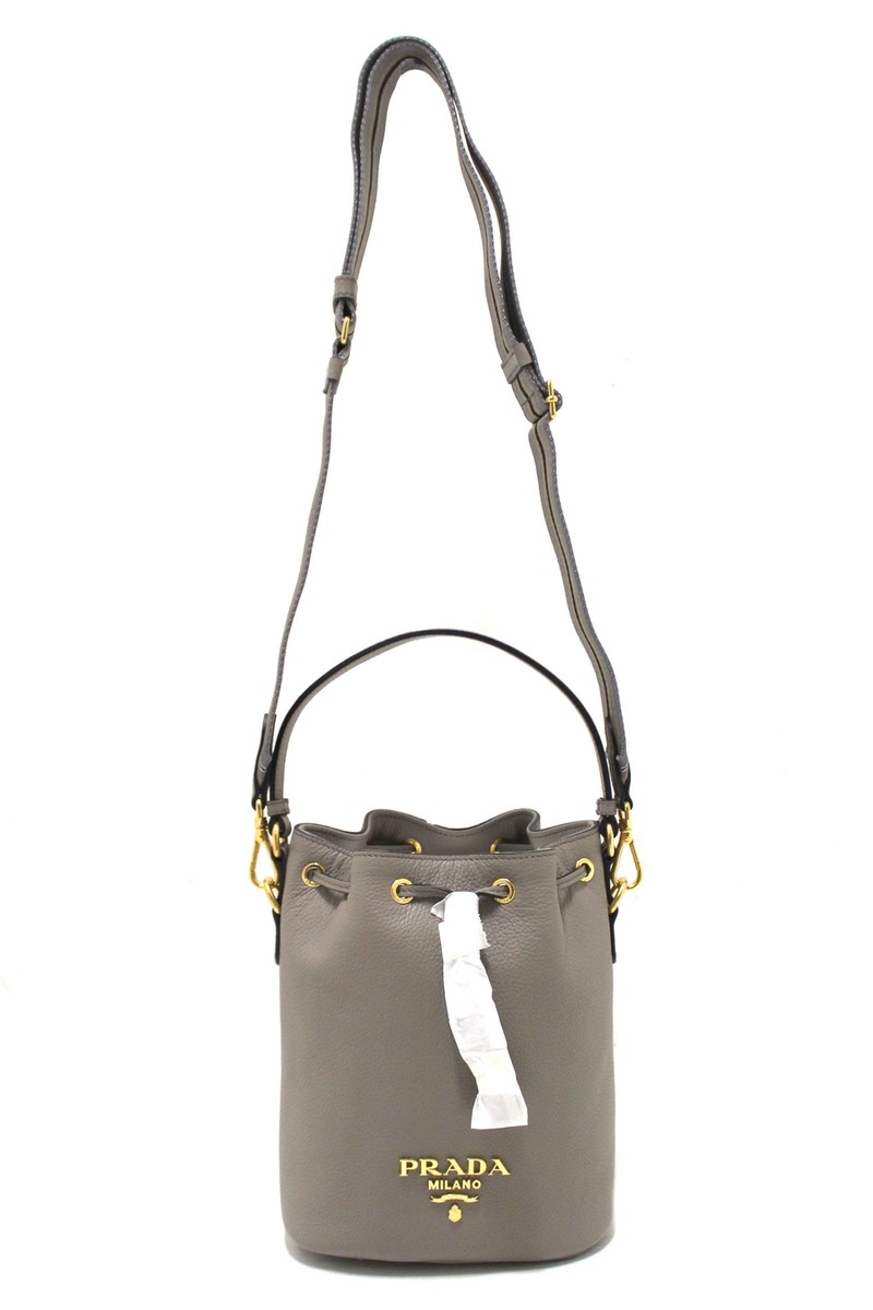 【PRADA】LEATHER BUCKET BAG White/Black Prada Buckle leather bucket bag with belt | PRADA