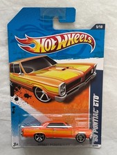 Hot Wheels 2011 Street Beasts '65 Pontiac GTO orange mint on unopened card