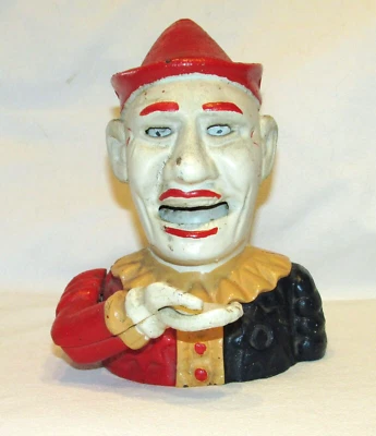 TIRELIRE MECANIQUE ANCIENNE EN FONTE CLOWN - Photo 1/4