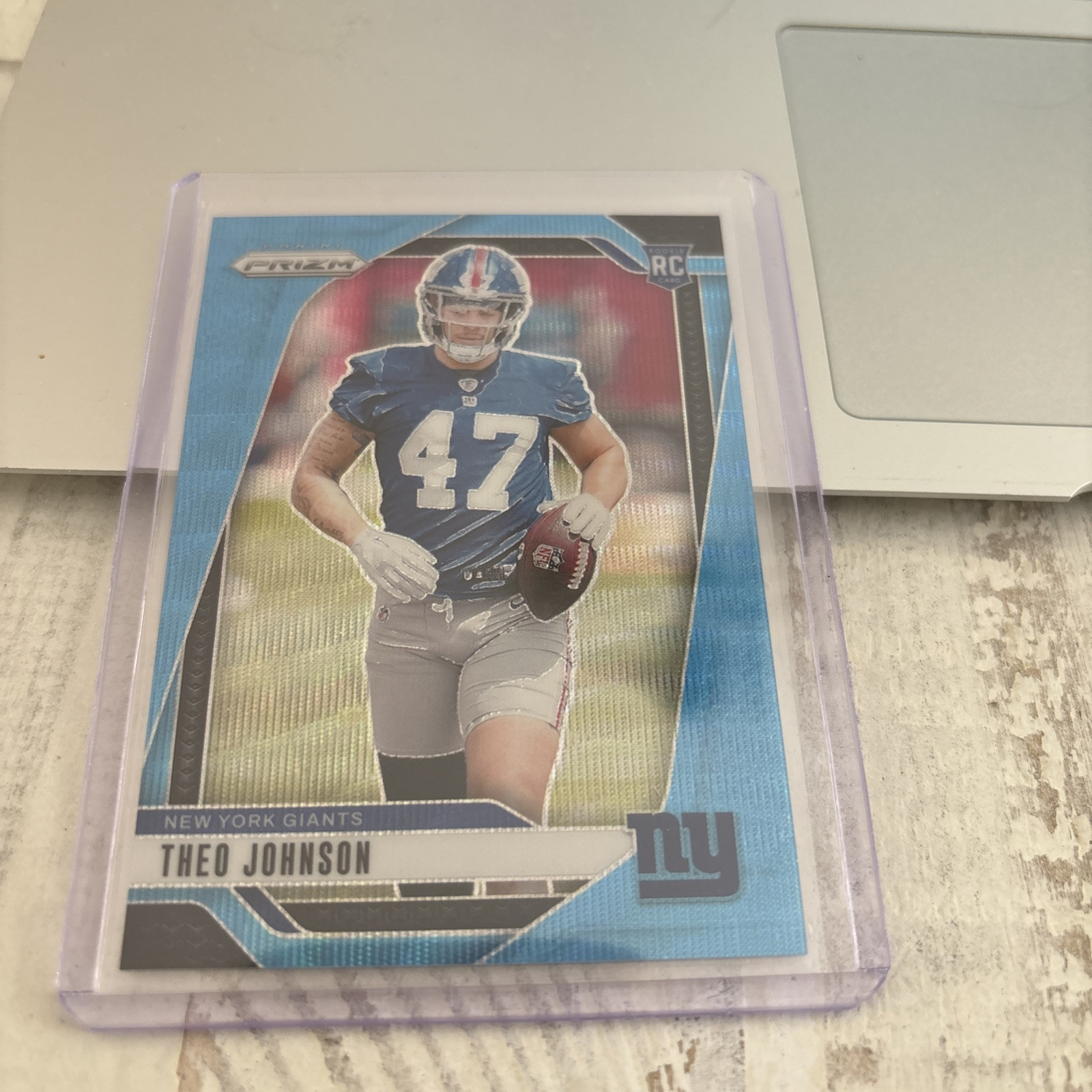 2024 Panini Prizm - Rookies Blue Wave Prizm #390 Theo Johnson /230 (RC)