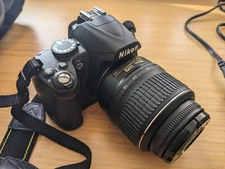 Nikon D3000 Mint Shutter Count 7064 with Carrying Case, Charger and Lens