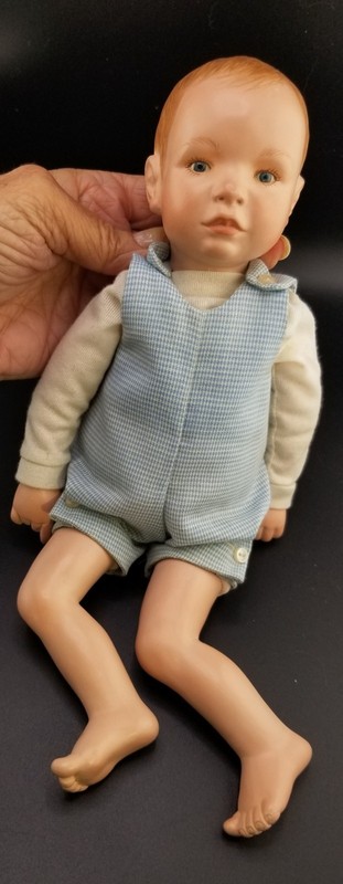 PORCELAIN  LITTLE BOY DOLL~WEIGHTED~ 1985  PRB? SIGNED~12" LONG  IN BLUE ROMPER