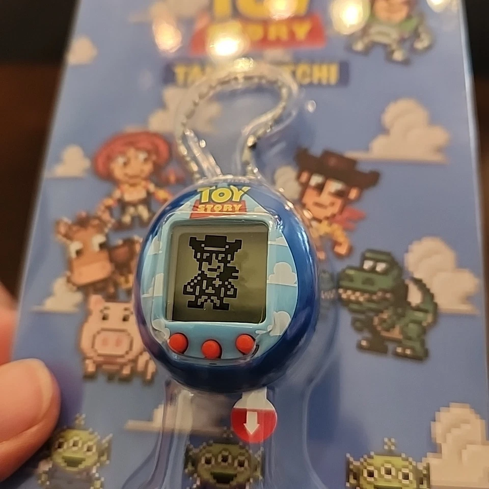 Disney Pixar Toy Story Tamagotchi Nano Electrónico Mascota Azul Leñoso Foto 2 de 3