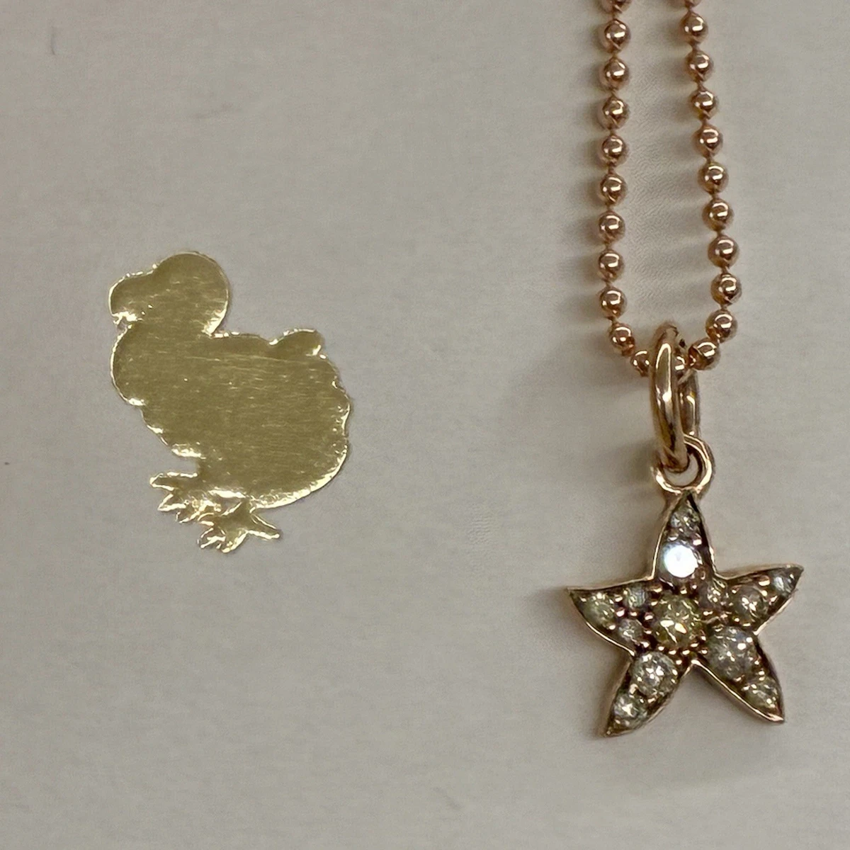 Pendente Stella Marina in Argento 925 in bagno d'oro e cristalli Pendente Stella Marina in Argento 925 in bagno d'oro e cristalli