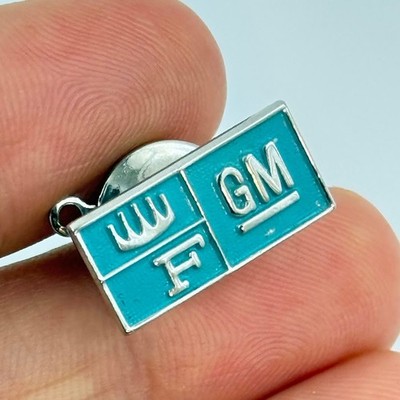 General Motors GM Mark of Excellence Blue Enamel Pin Employee Award Advertising