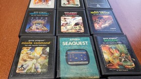 Atari 2600 Game Lot 24 Carts Pitfall Kaboom Atlantis Mario Bros Pac‑Man