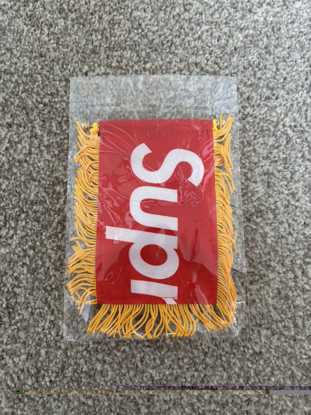 Supreme FW26 Hanging Flag Pendant Accessory - Sealed