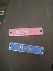 pair of vintage American porcelain enameled iron restroom signs Men WOMEN