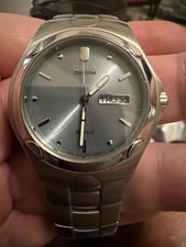 Citizen Eco-Drive Day Date Slate Grey Sunburst Dial WR100 Steel Watch E100