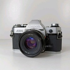 Canon AE-1 + FD 50mm f/1.8 Lens  Working Order Canon Ae1 35mm SLR Camera 