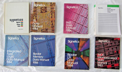 Group of  7 Signetics Data Books and 1 hardbound Signetics  Applications book