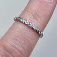 Hallmarked Brown & Newirth Pravins 18ct White Gold .25ct Diamond Eternity Ring M