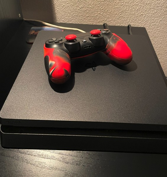 PS4 Slim 1TB Console + Original Controller + Cables