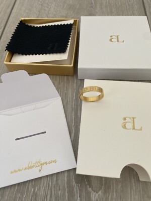 Abbott Lyon Ring goldfarben gestempelt ''Amore'' Neu in OVP