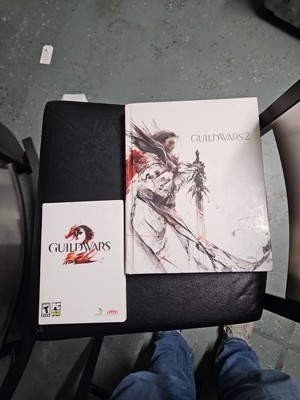 Guild Wars 2 and  Hard Cover Users Guide. - PC - 2 Disc CD 