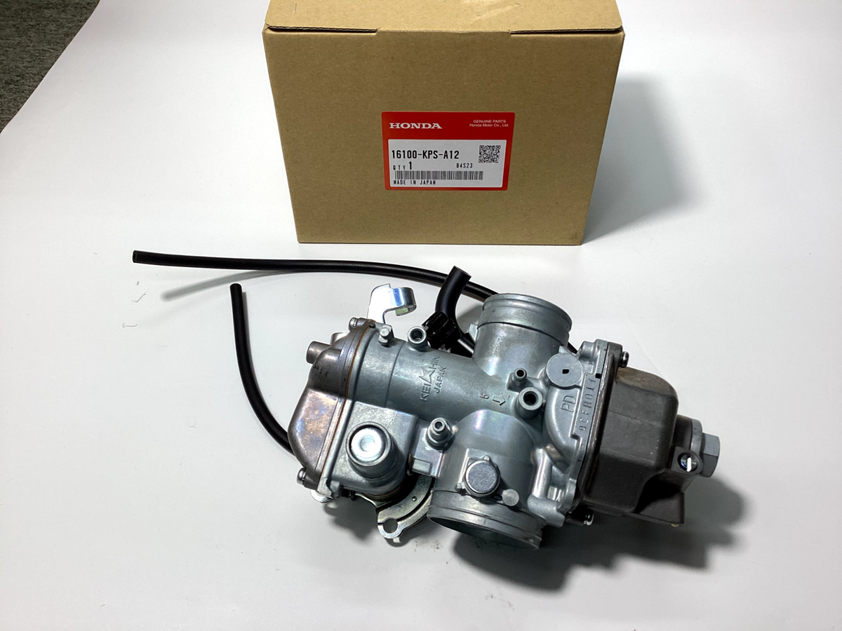 to GENUINE HONDA OEM CARBURETOR 2003-12 CRF230F 16100-KPS-A12